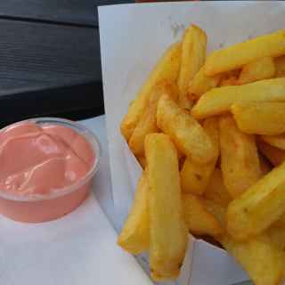 Chips and hot spicy sauce in Ghent, Belgium