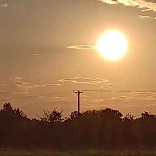 Sunset over the fields near my house