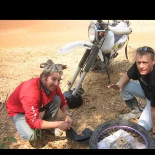 Fixing punctures, whilst trail riding outta Phnom Penh 
