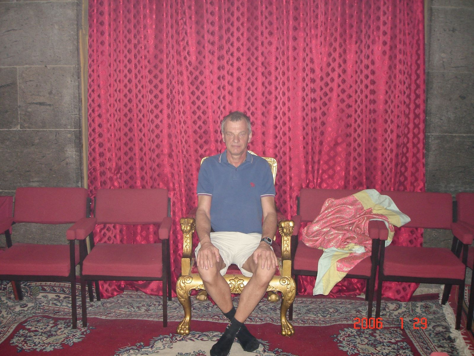 Sitting on the Etiopian emperor's chair in Addis Abeba Ethiopia