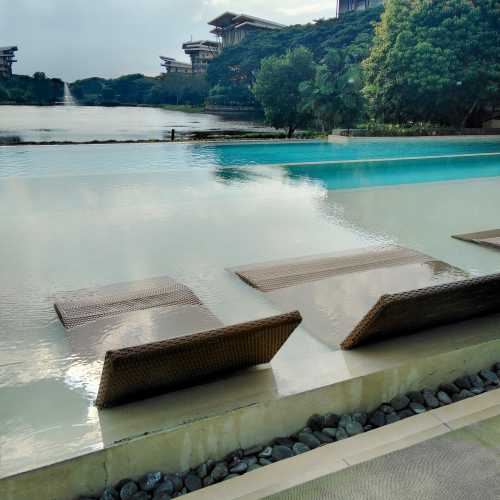 Relaxing by the pool, Pico De Loro Resort, Hamilo Coast, The Philippines. 