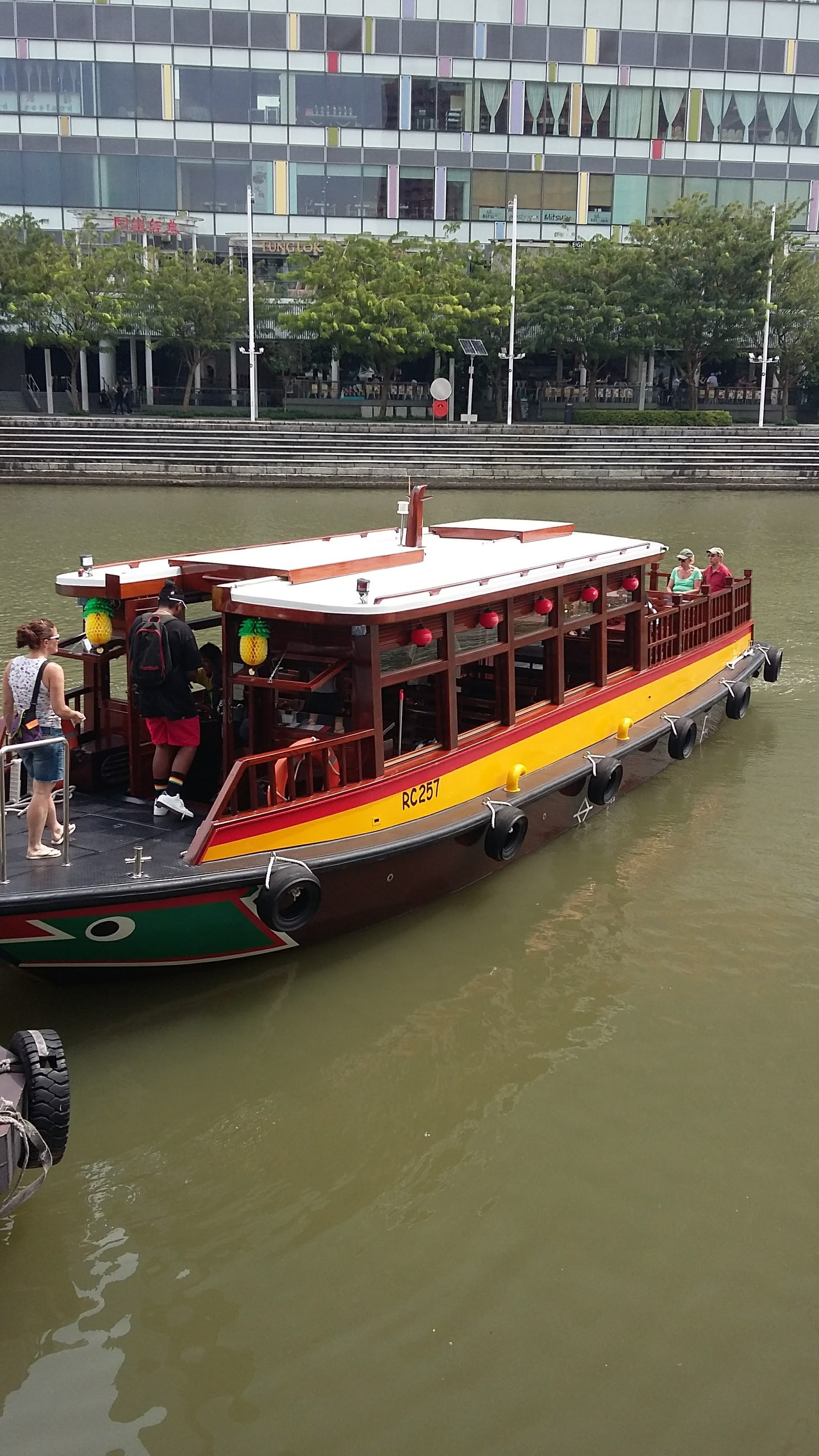 Awaiting a boat trip on the Singapore River down to Marina Bay 