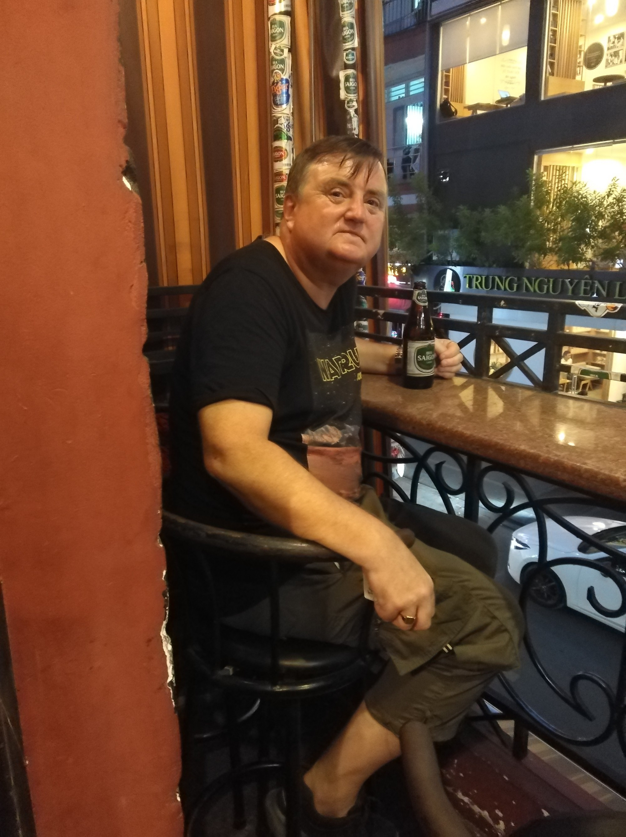 Having a drink and a bite to eat, Ho Chi Minh City, Vietnam 