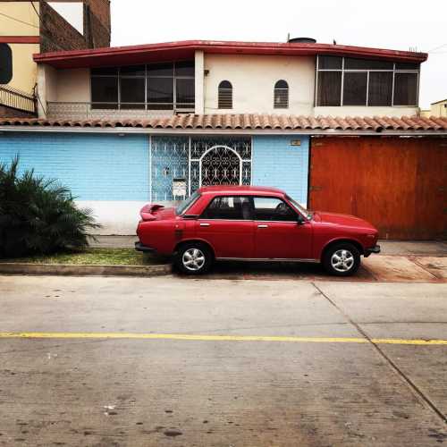 Old car at a street in San Borja, Lima