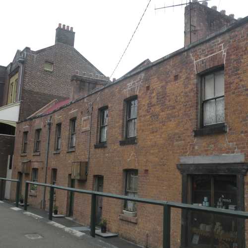 The Rocks is a neighbourhood of historic laneways in the shadow of Sydney Harbour Bridge