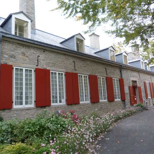 Red Shutters on building