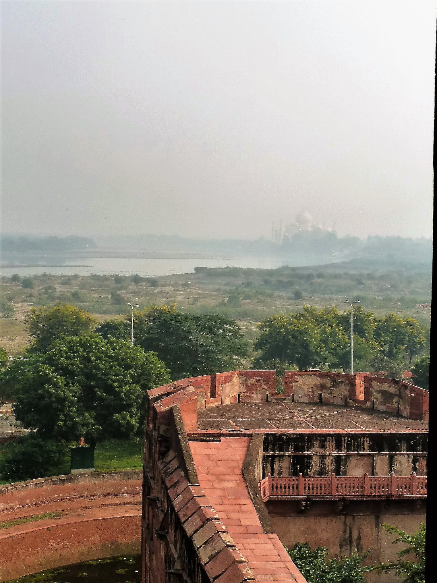 Taj through the smog from the battlements