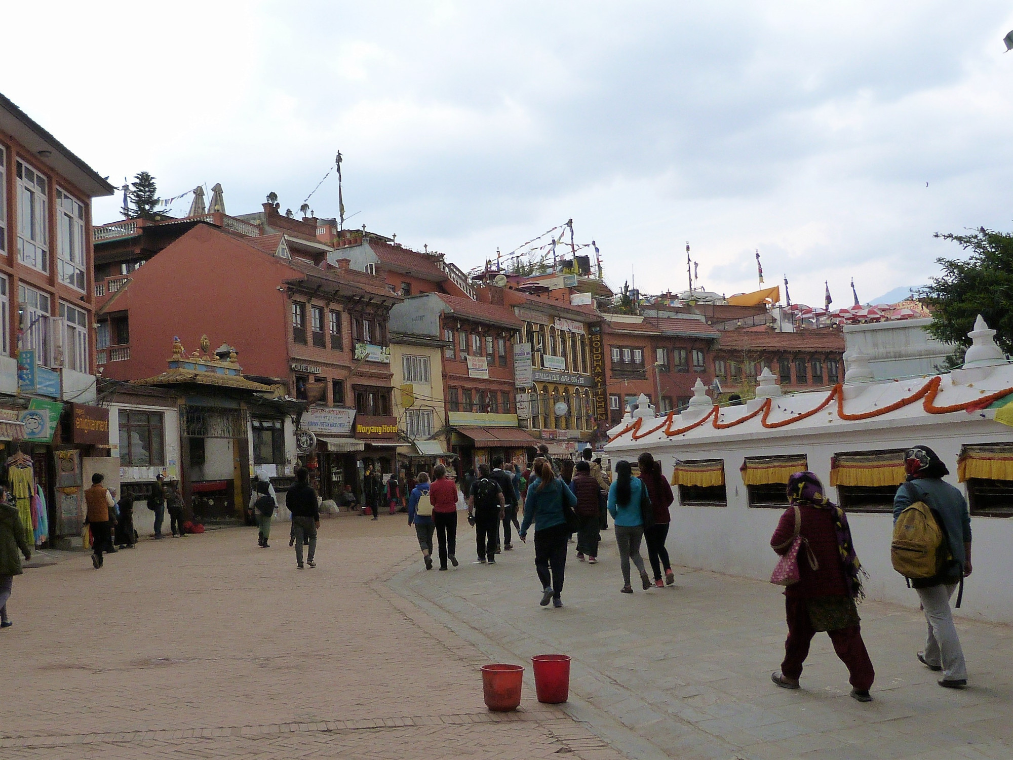 People walking around the Stupa