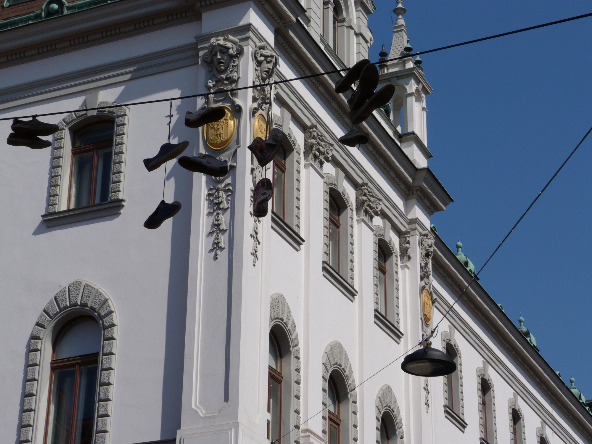 Shoes hanging from telephone wires
