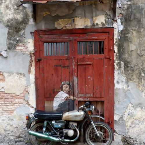 Boy on motorcycle Mural<br/>
Ah Quee Street