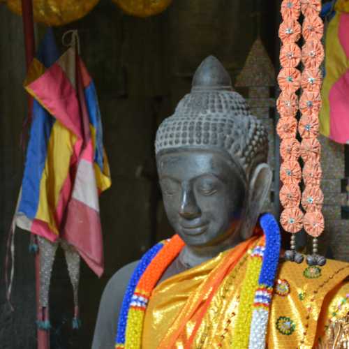 Buddha figure dressed for prayer