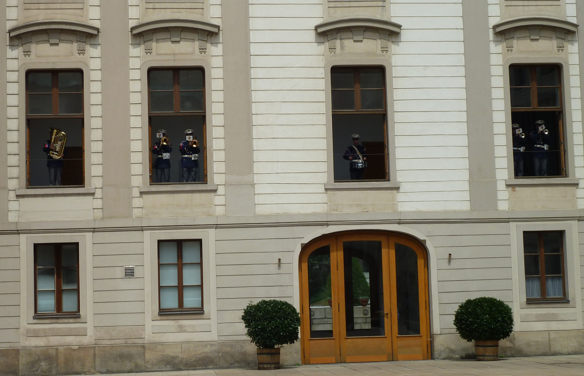 band members playing through Palace windows at Changing of the Guard