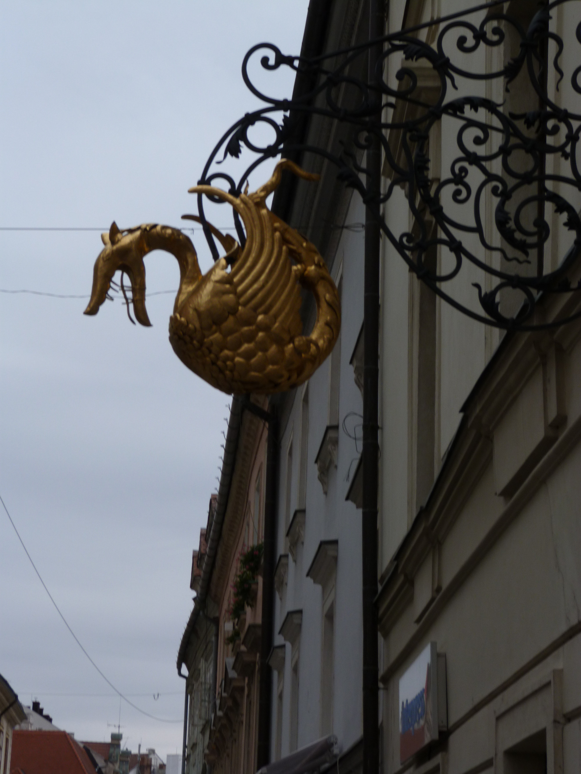 Golden Dragon hanging above a pharmacy