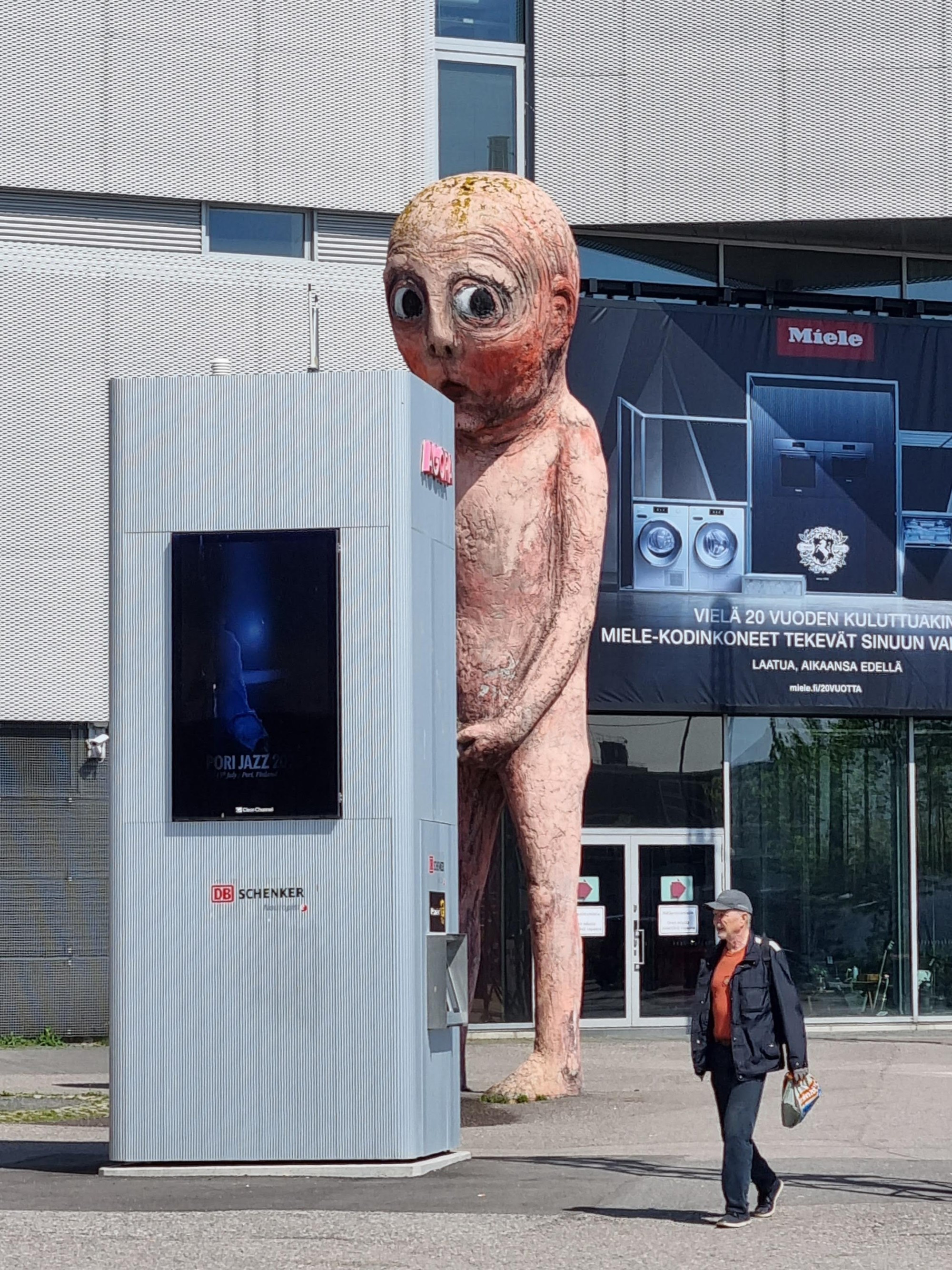 Statue of peeing man, Finland
